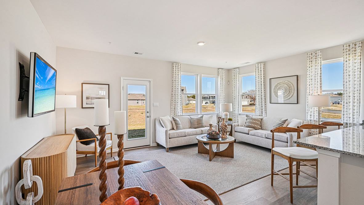 The kitchen is open to the ample living room and dining area.
