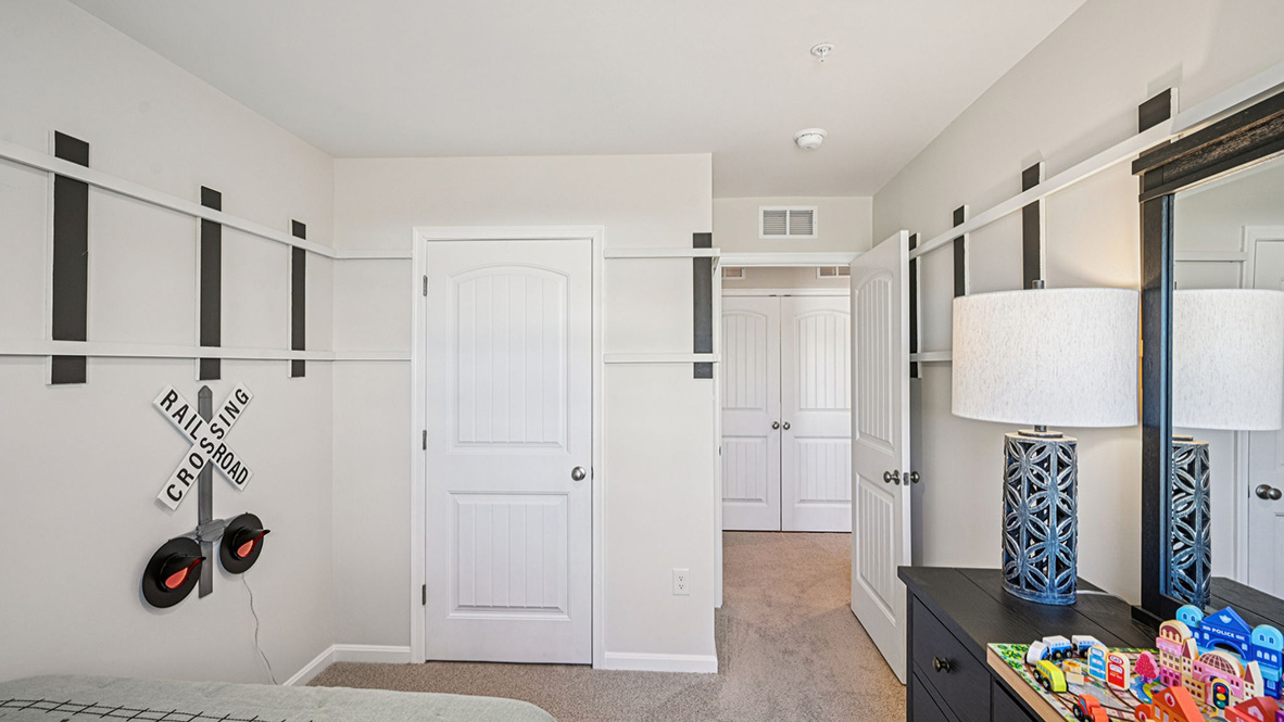 Additionally, there are two sizeable guest bedrooms, each with plenty of closet space.