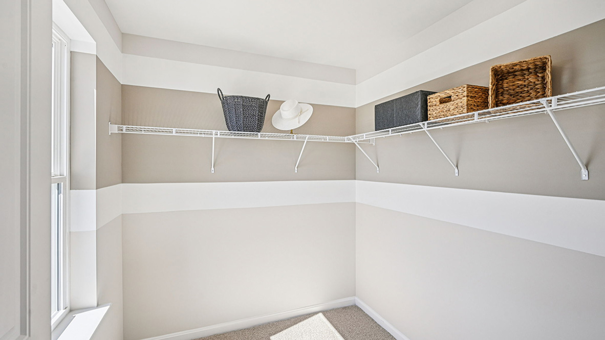 Upstairs, the spacious main bedroom comes complete with an oversized walk-in closet.