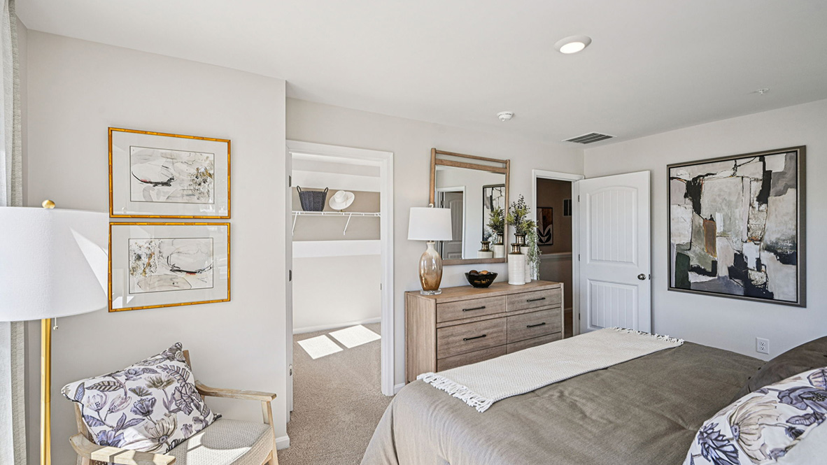 Upstairs, the spacious main bedroom comes complete with an oversized walk-in closet.