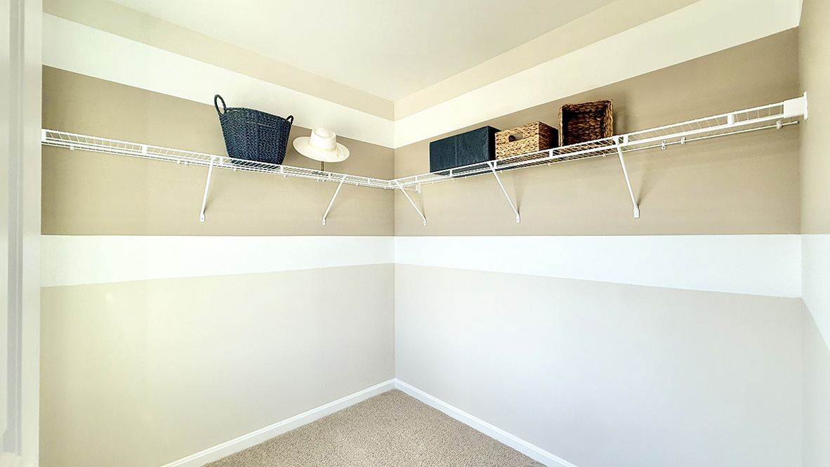 Upstairs, the spacious main bedroom comes complete with an oversized walk-in closet.