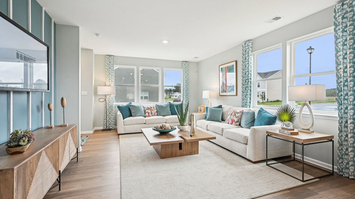 Large windows fill the living room.