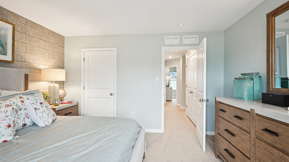 Another view of the primary bedroom.