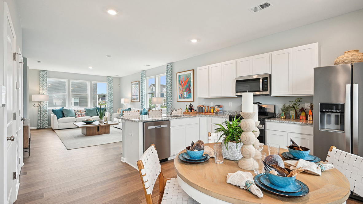 Dining area overlooking kitchen and living rooms.