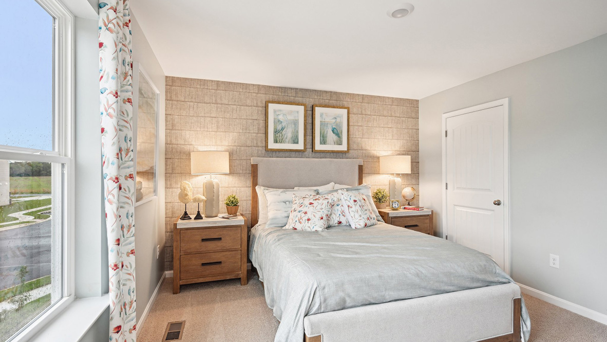 The primary bedroom has an ample walk-in closet.