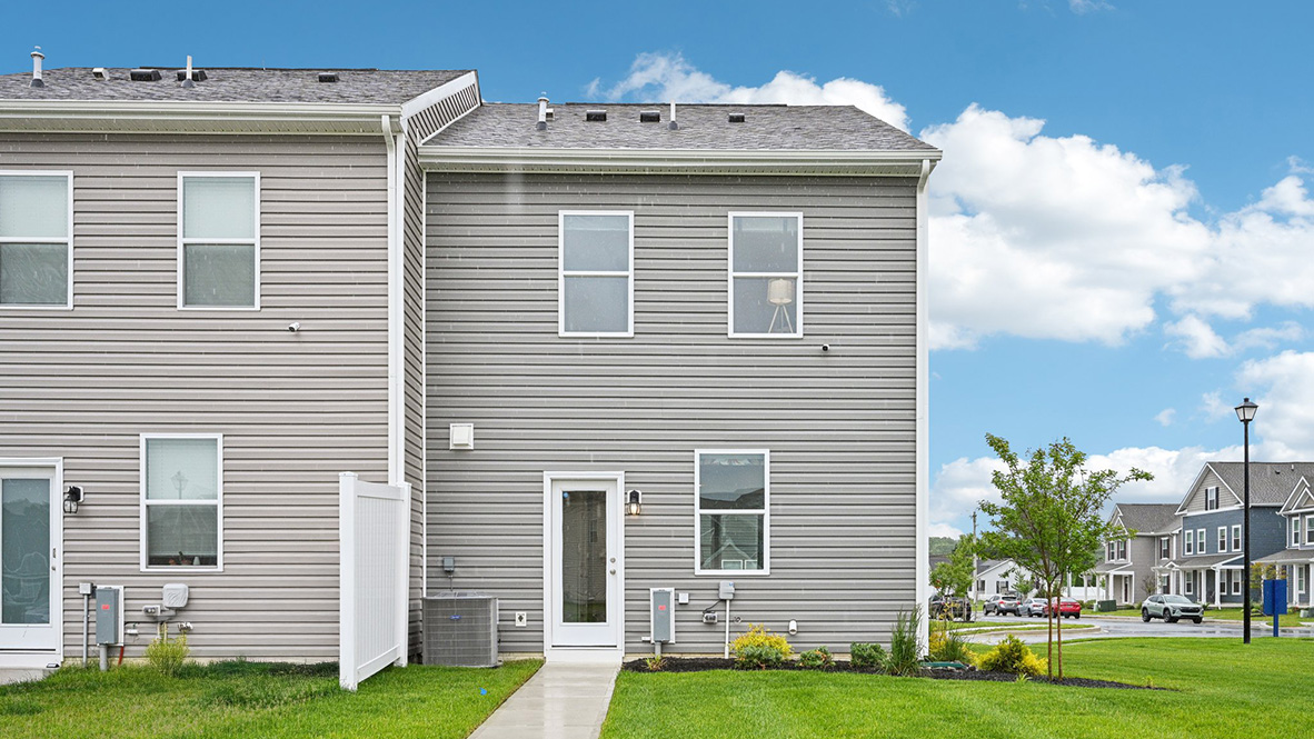 The back of the exterior end unit townhome.