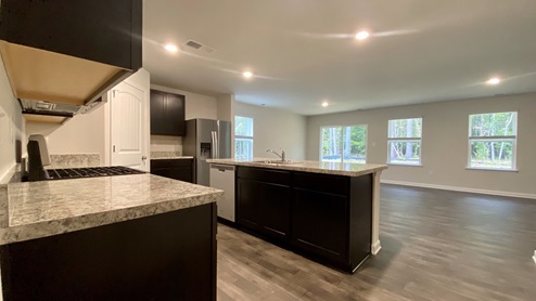 Lismore open floor plan from kitchen leading to lving area.