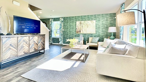 Large living area with plenty of natural light.