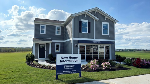 Heritage Trace Deerfield model home with blue siding.