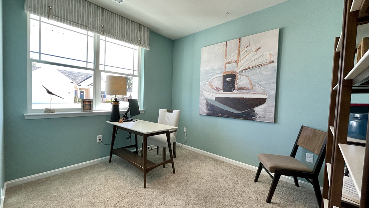 The flex room is in the front of the home.