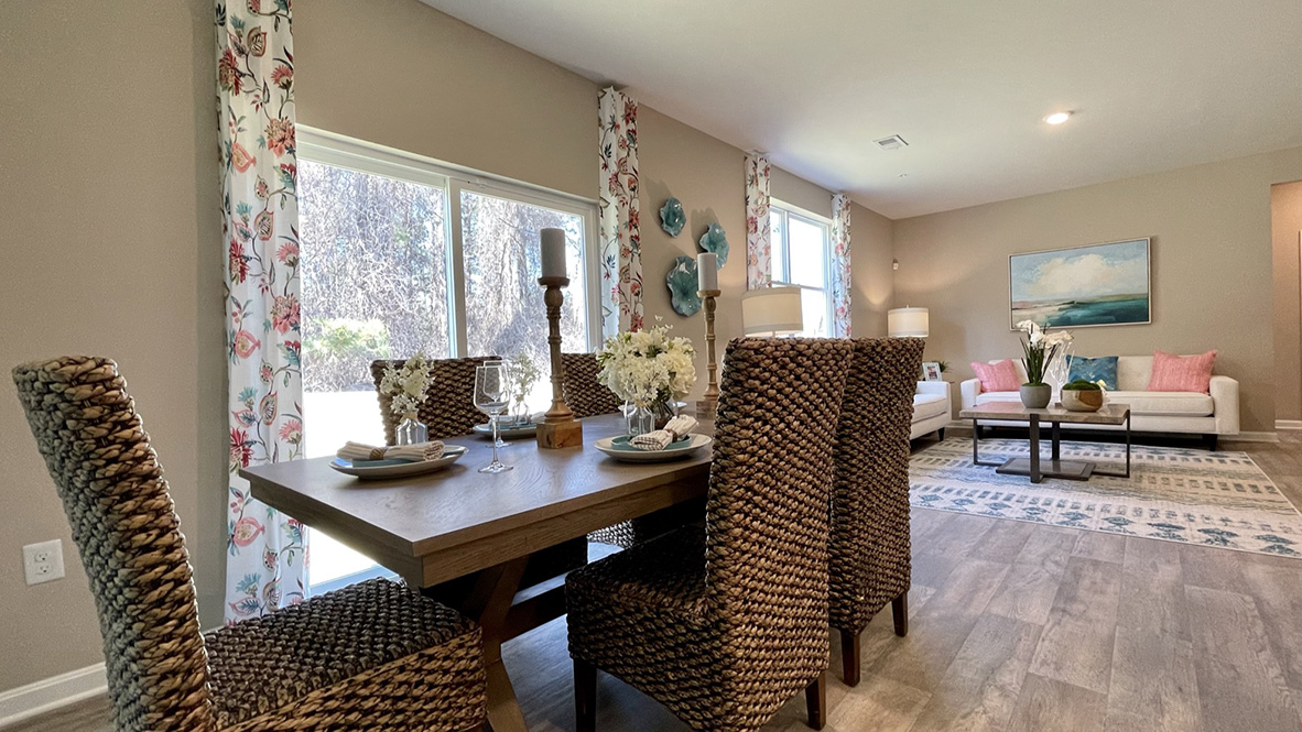 The dining area is next to the back sliding glass door.