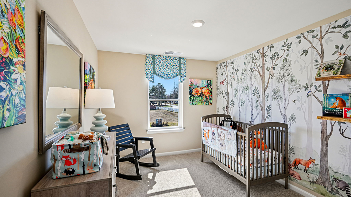 A guest bedroom with one window.
