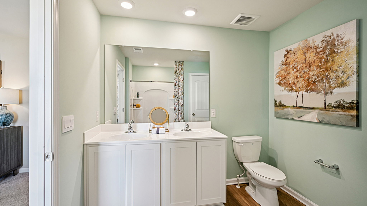 A private primary bathroom completes the owner's suite.