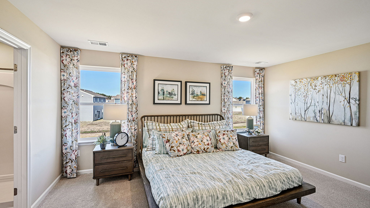 The primary bedroom has two windows.