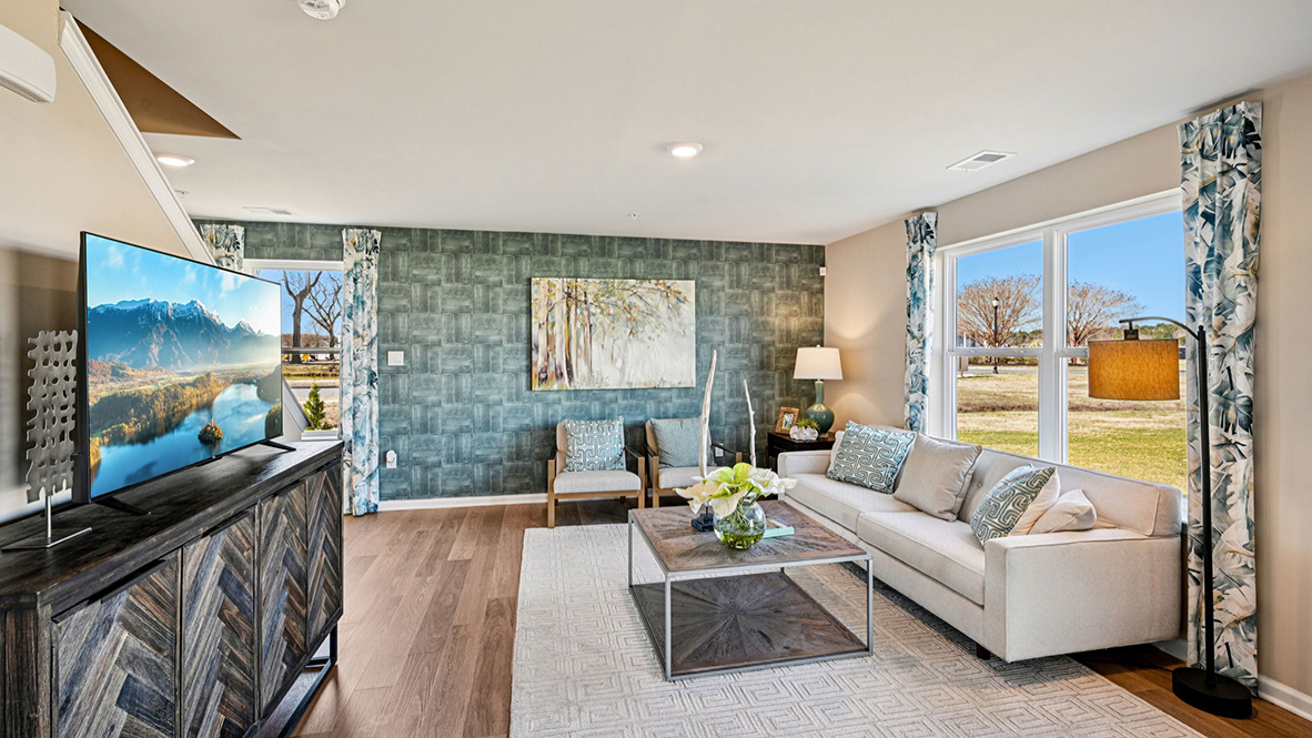 Large living area with plenty of natural light.