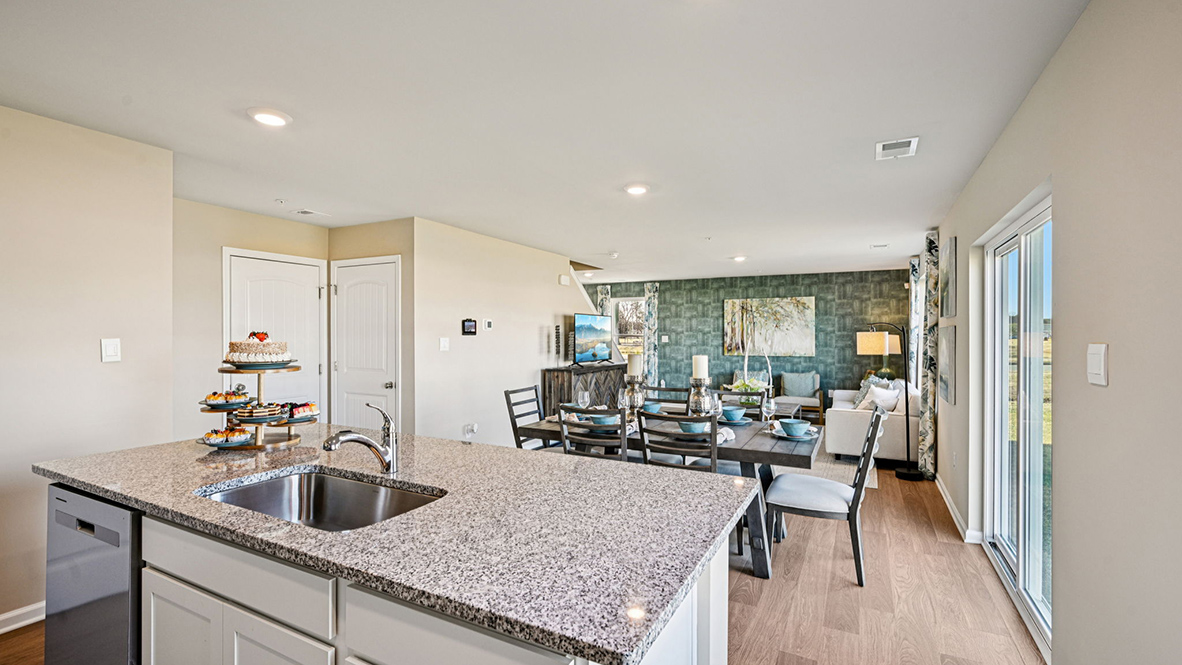 The spacious kitchen has a large island.