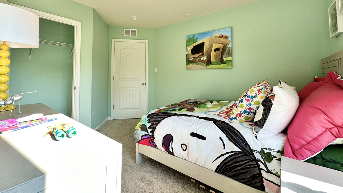 Looking at the bedroom closet from the guest bed.