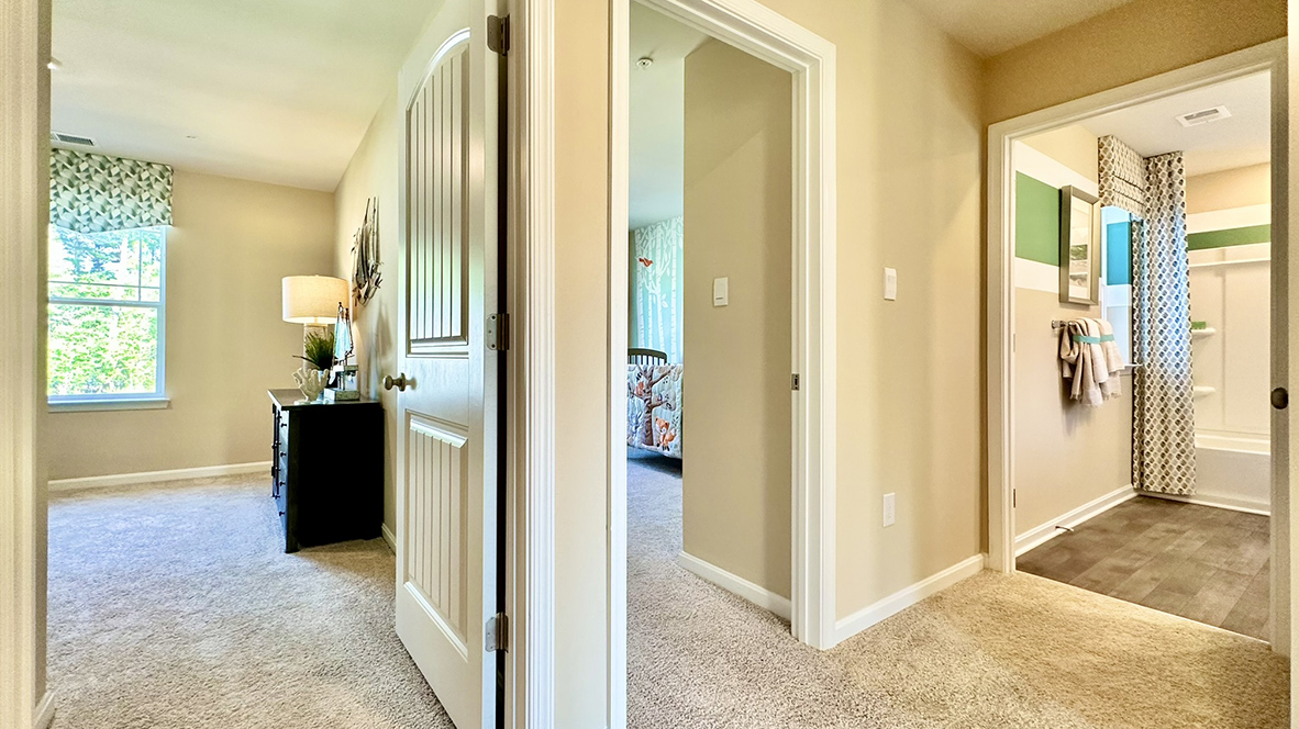 The upstairs hallway is open and airy.