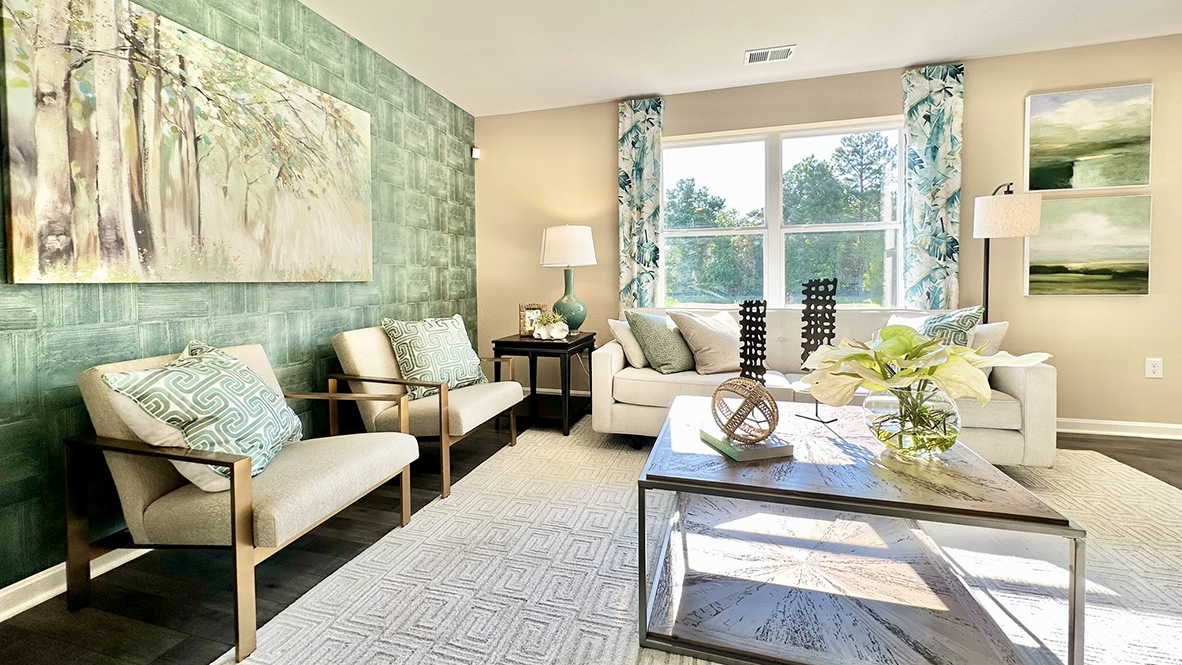 The windows give lots of light inside this open-concept living room.