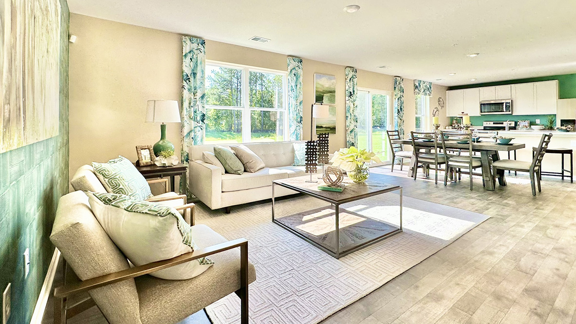 Living area that flows into the kitchen.