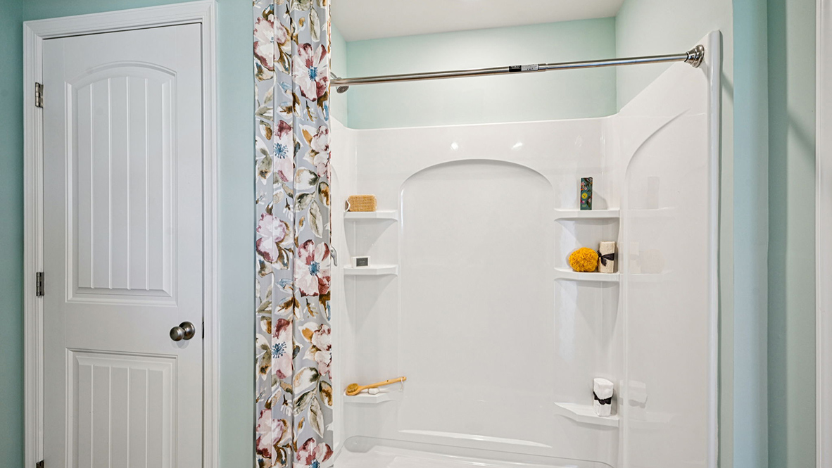 A private primary bathroom completes the owner's suite.