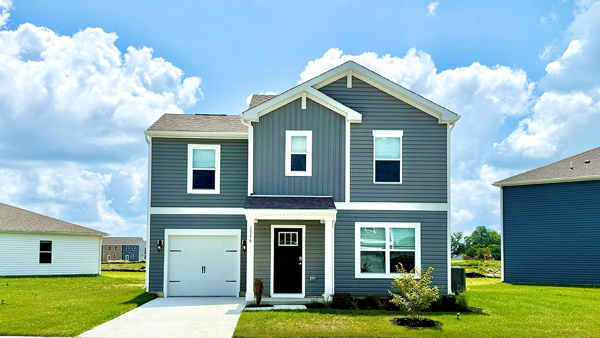 A two-story home with a one-car garage in Salisbury, MD.