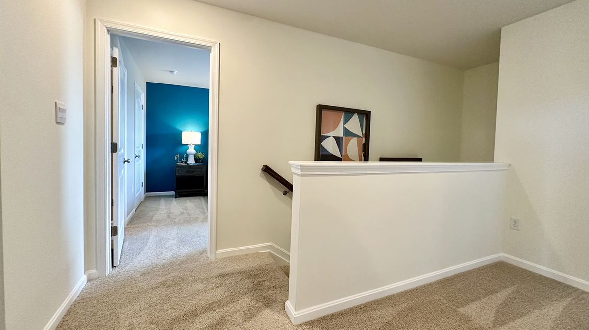 Upstairs is three bedrooms and two bathrooms.