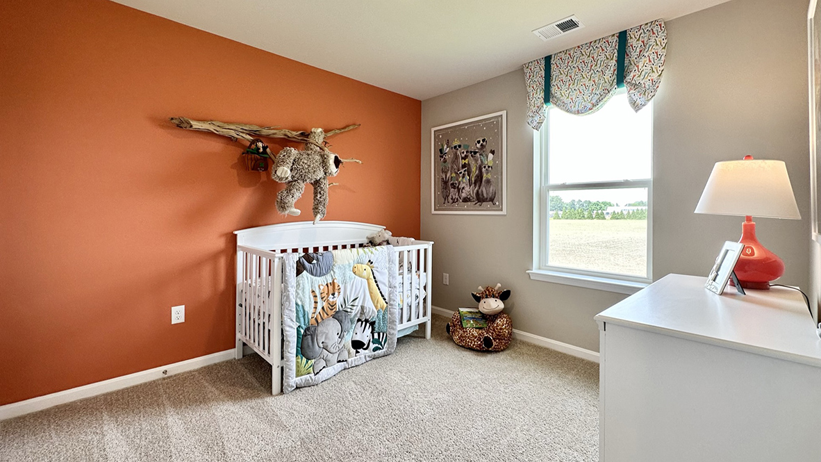 Continuing down the hallway, the two additional well-sized bedrooms each have plenty of closet space.