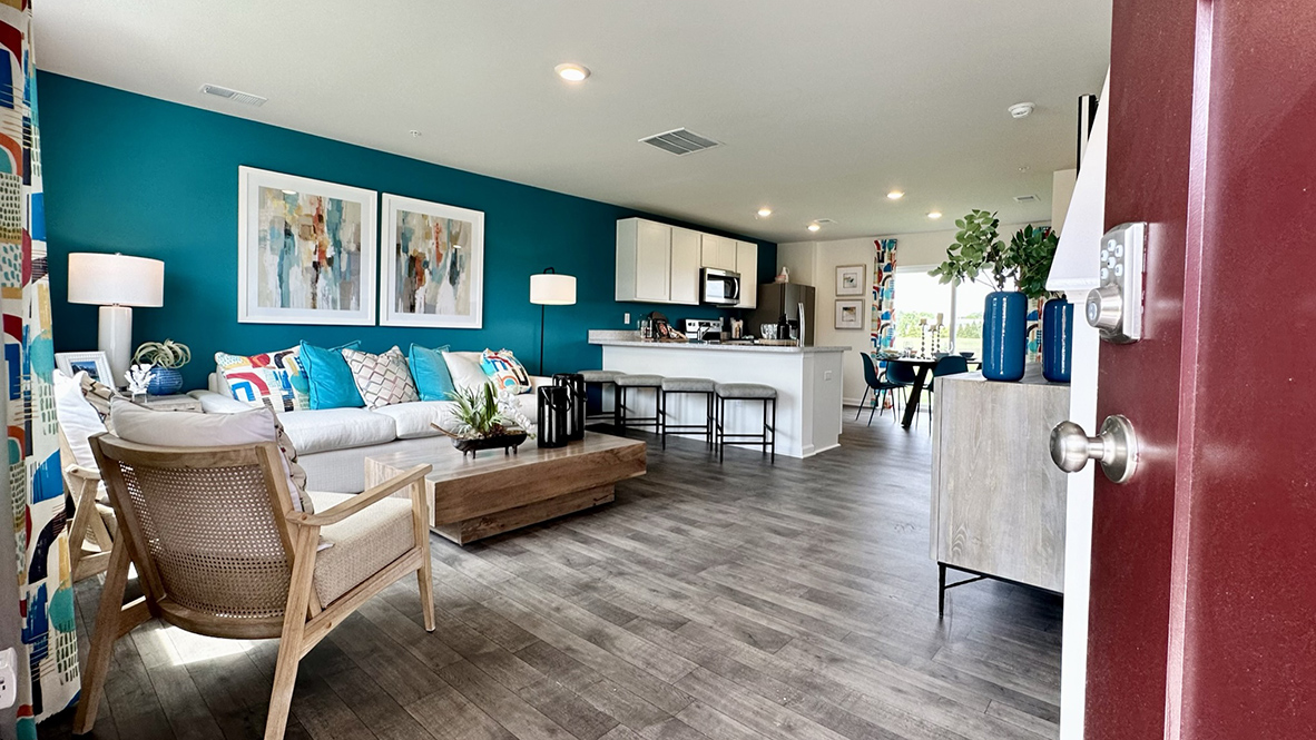 The foyer leads you to the sizeable family room with an abundance of natural light.