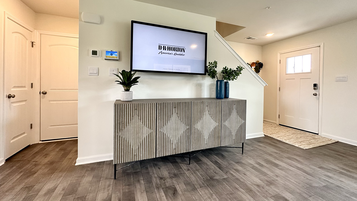 The foyer leads you to the sizeable family room with an abundance of natural light.