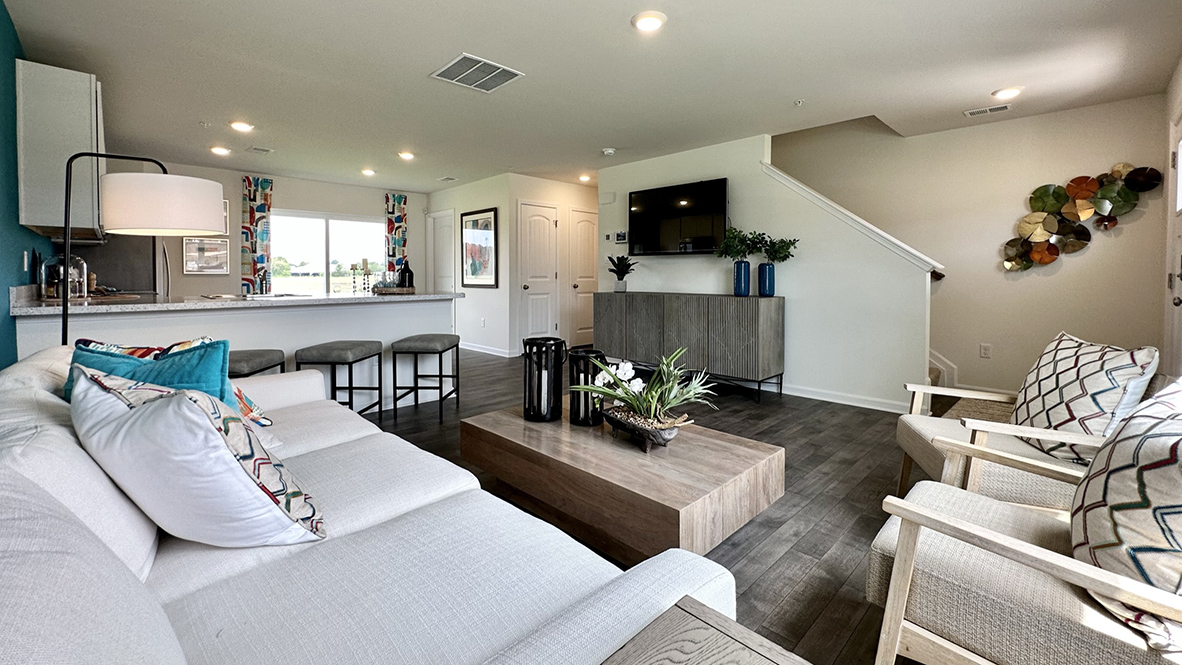 The open-concept floorplan allows the family room to flow easily into the eat-in kitchen.