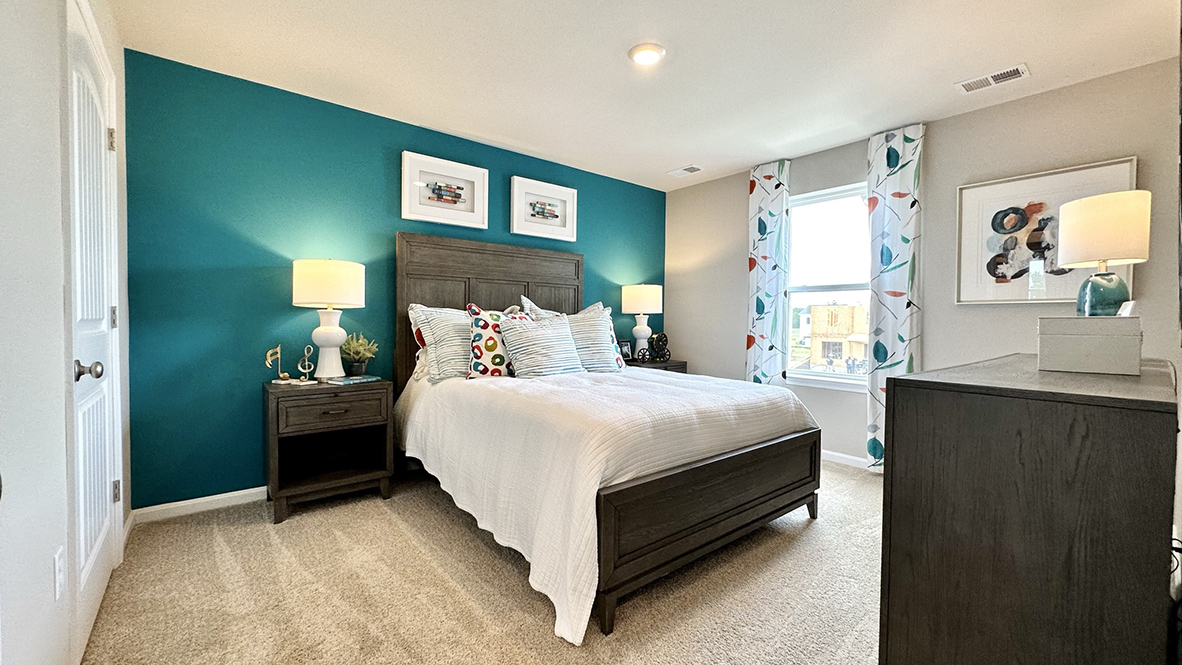 Upstairs, the owner's suite is a quiet retreat.