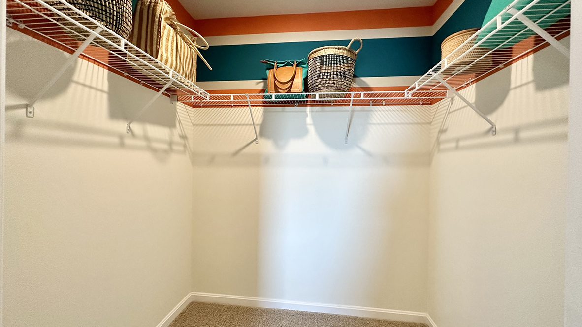 Upstairs, the owner's suite is a quiet retreat featuring a walk-in closet.