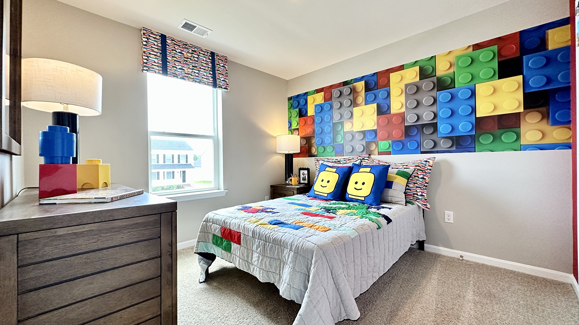 Continuing down the hallway, the two additional well-sized bedrooms each have plenty of closet space.