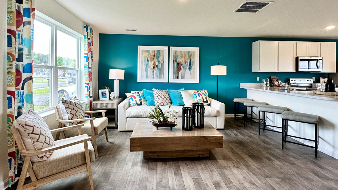 The open-concept floorplan allows the family room to flow easily into the eat-in kitchen.