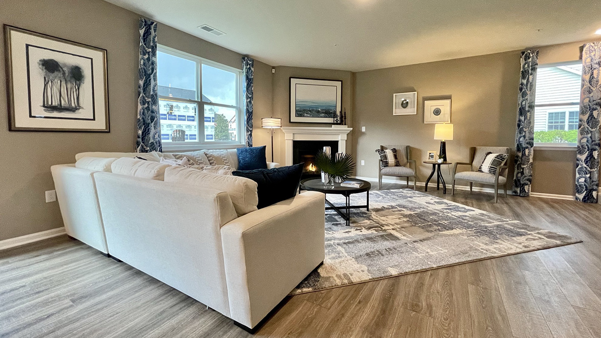 The Hanover open-concept first-floor living room has the option of a gas fireplace.