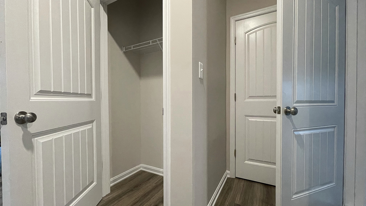 A coat closet is located near the two-car garage.