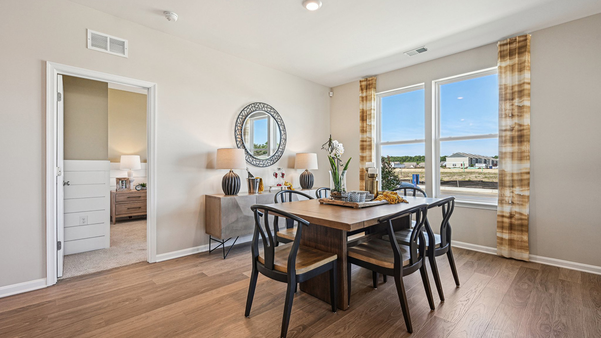Just off the great room and kitchen is a dining area.