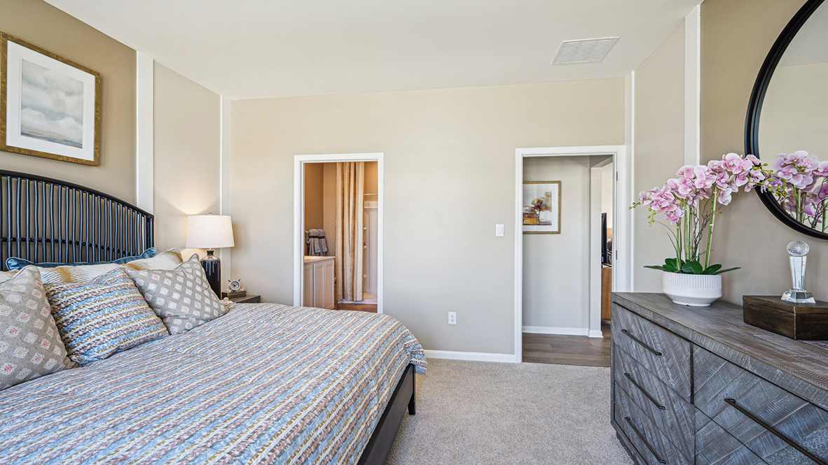 The owner's suite boasts a sizable en suite bathroom.