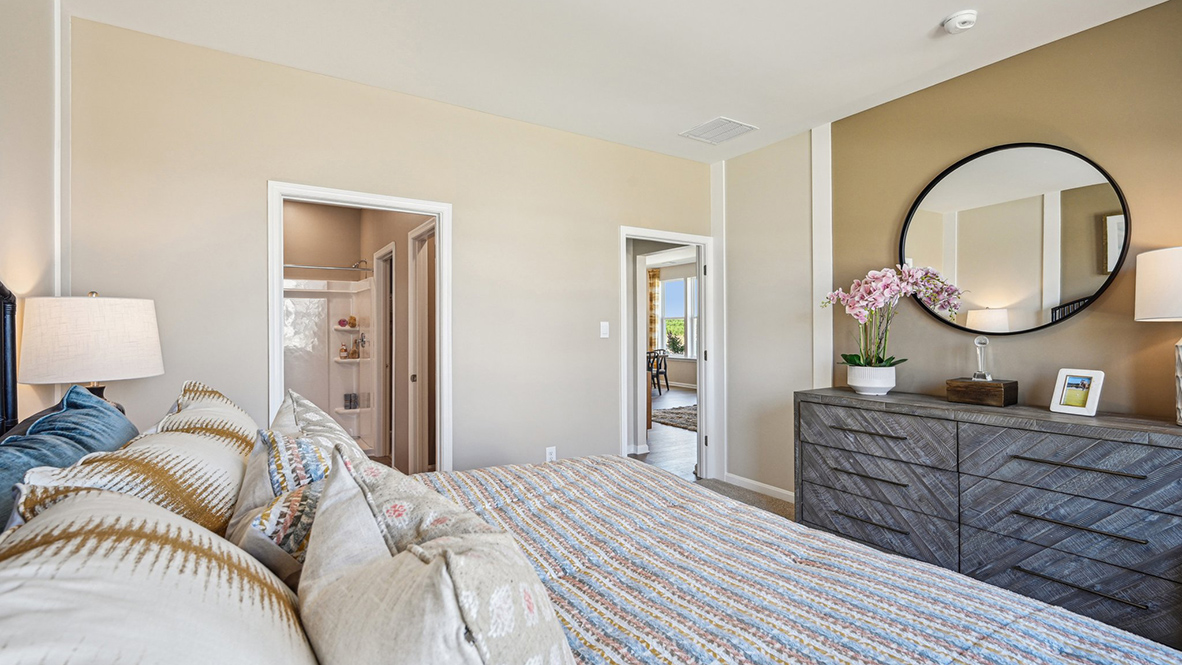 The owner's suite boasts a sizable en suite bathroom.