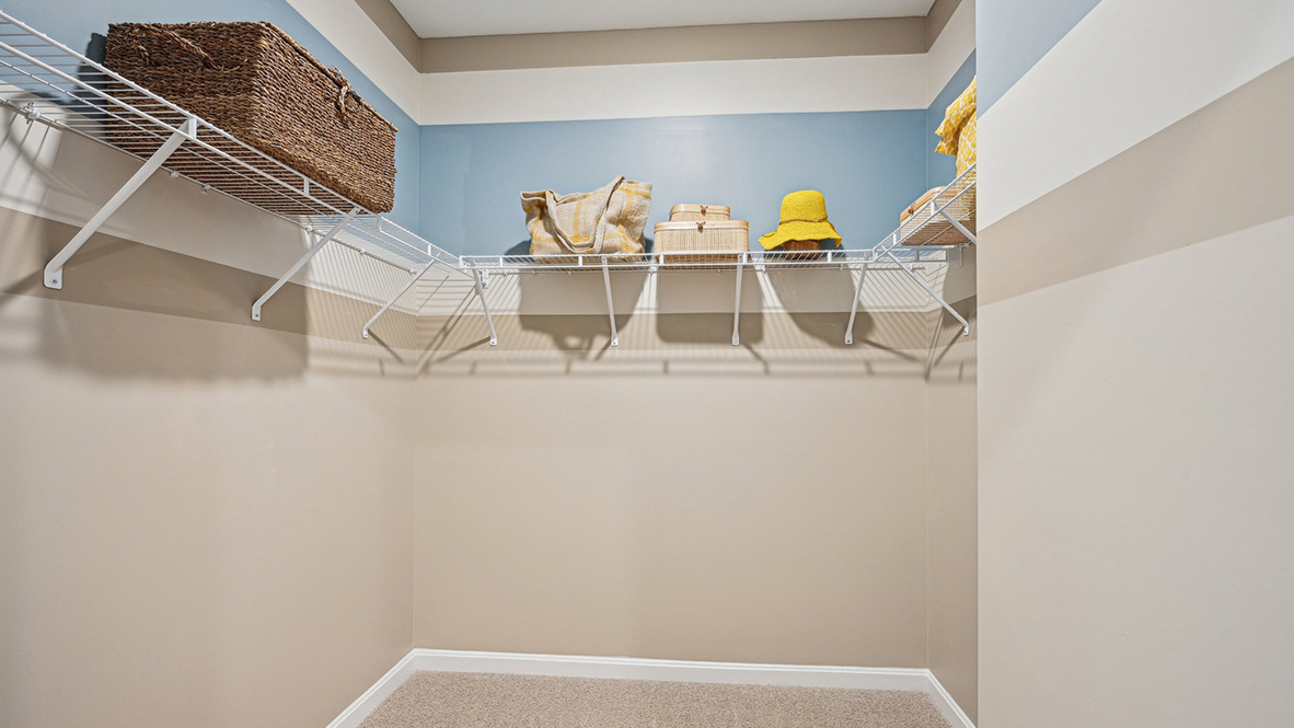The owner's suite boasts a large walk-in closet.