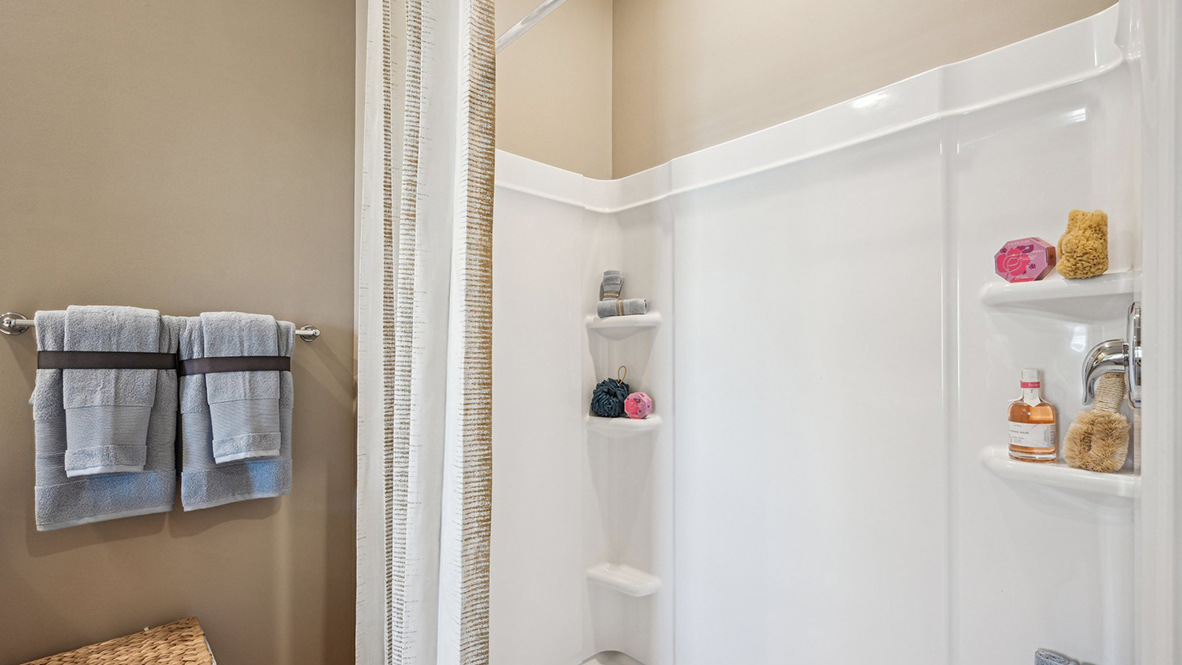 The owner's suite boasts a large walk-in shower.