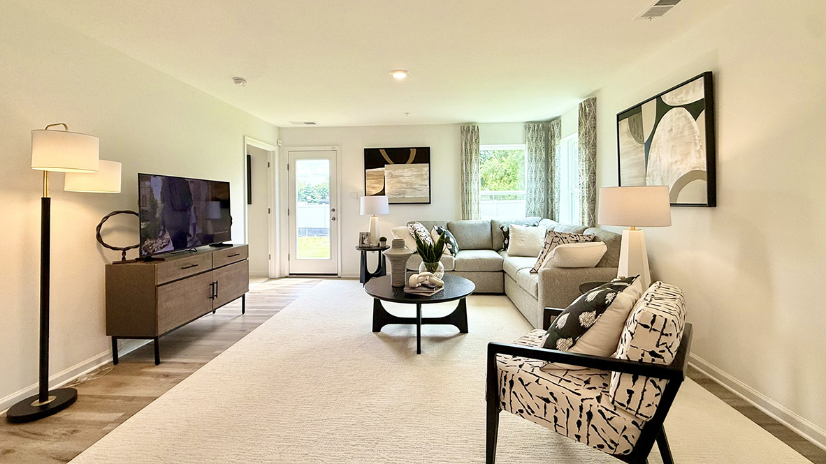 The kitchen flows seamlessly into the dining area and great room.