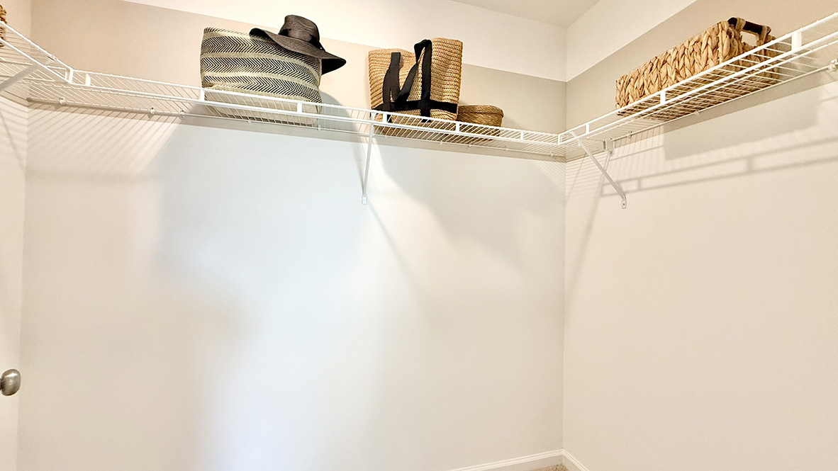 The large main bedroom has an impressive walk-in closet.