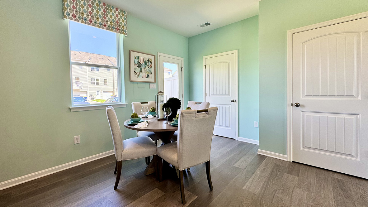 A powder room is off the dining area.
