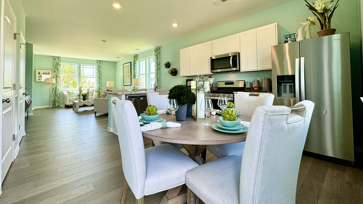 Dining area overlooking kitchen and living rooms.