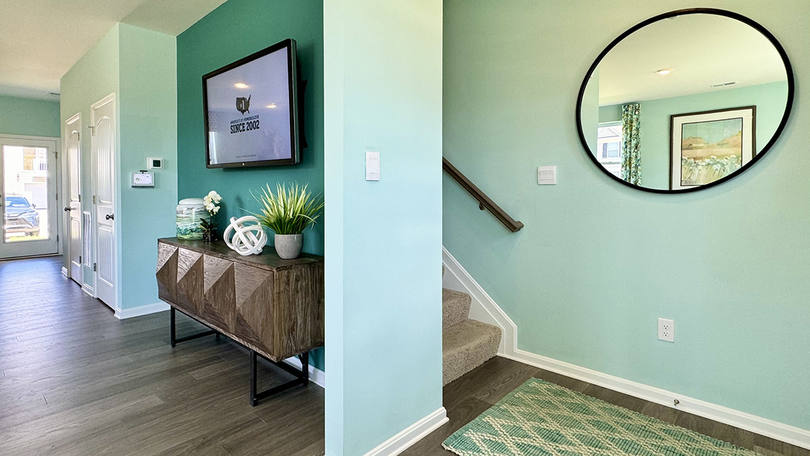 The stairway is located in the front of the home.