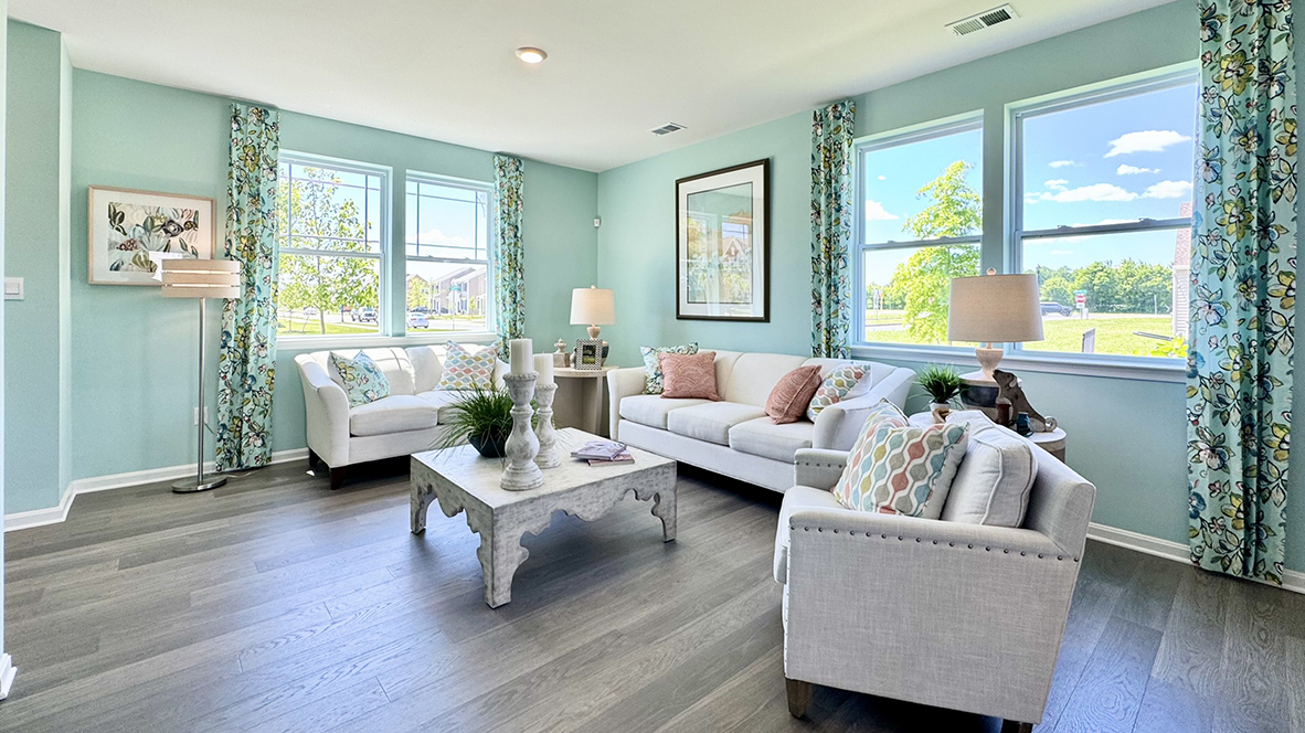 Large windows fill the living room.