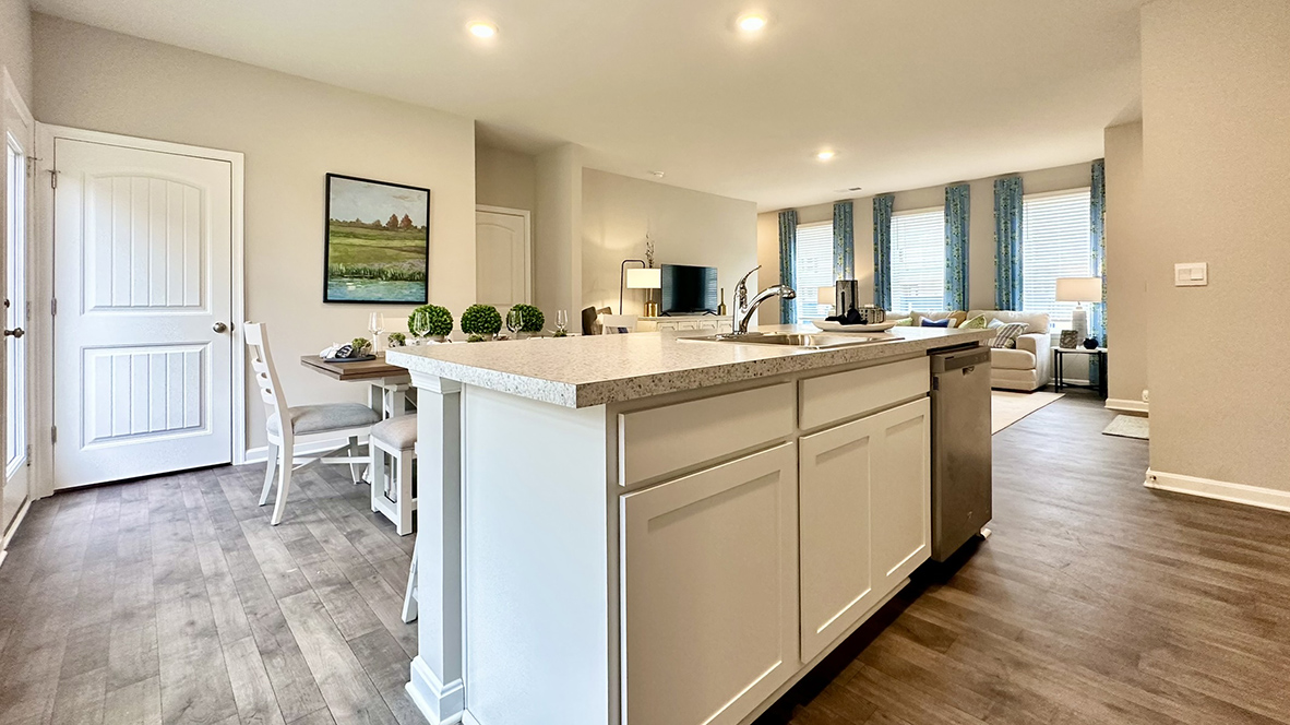 The home's well-designed eat-in kitchen boasts a large island.
