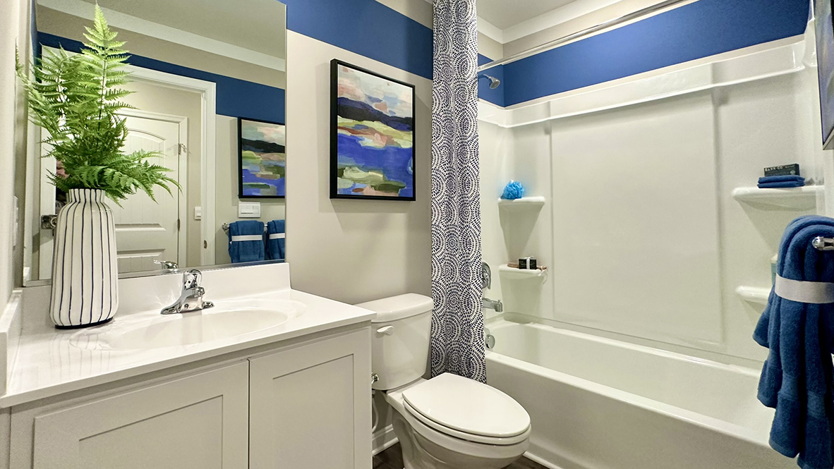 The two additional bedrooms share the second full bathroom.